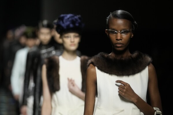Prada gives new meaning to bows and aprons historic elements of